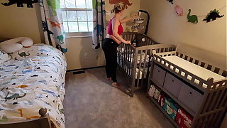 Pregnant Mom gets stuck in crib and son has to come help her get abroad